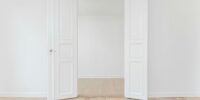 minimalist photography of open door