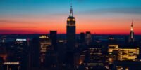 City skyline with JPMorgan Chase building at dusk.